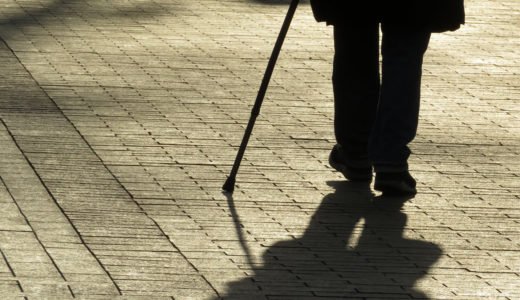 Man with cane requesting reasonable accommodation