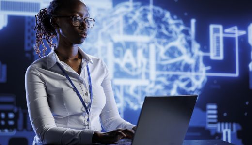 The Largest Study of AI Hiring Tools Ever Conducted Found Real Racial Bias. Here's What That Means for You 5 A Black woman working with AI in a San Francisco office.